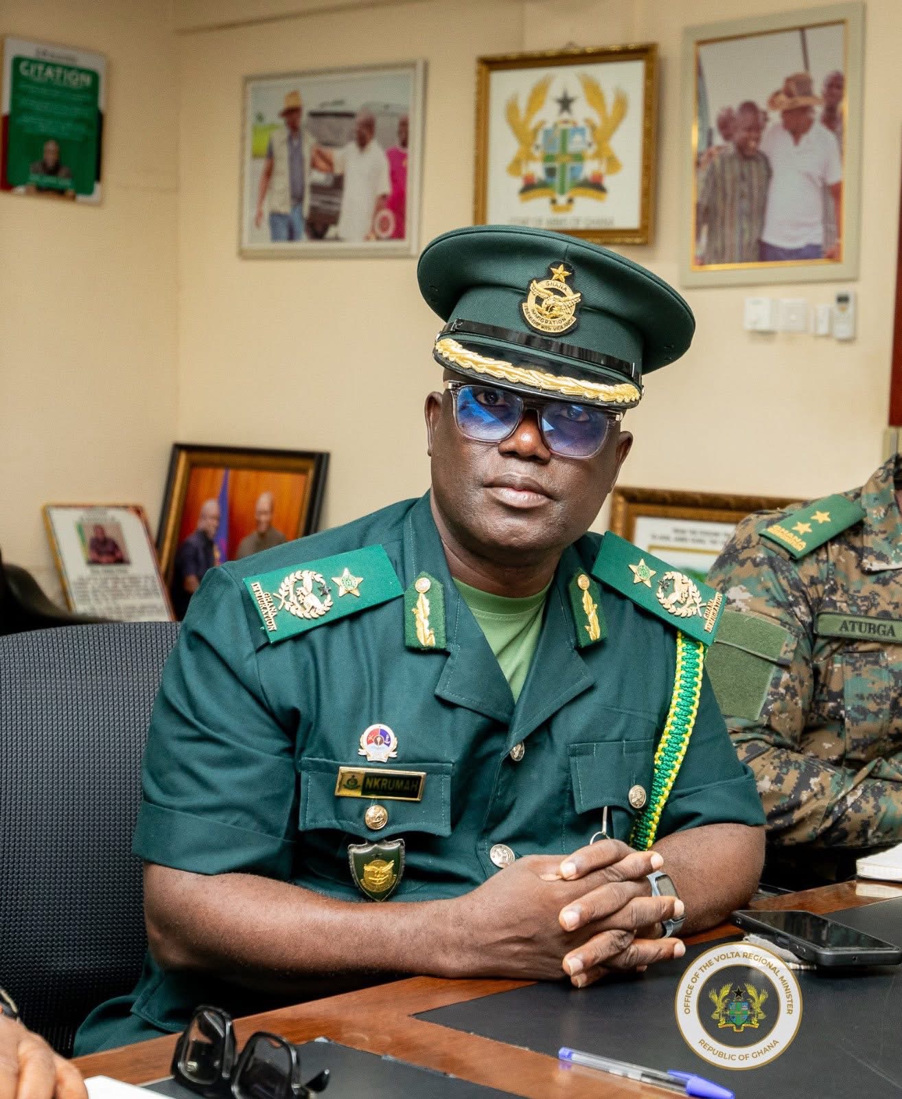 Hon. James Gunu engages the Deputy Comptroller-General (Operations) of the Ghana Immigration Service