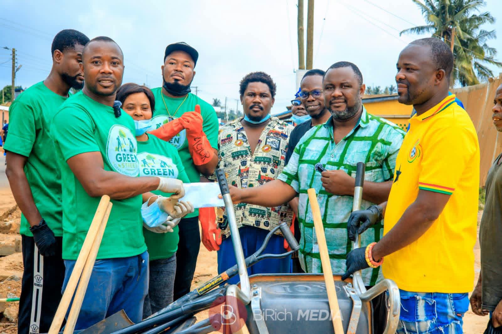 Hon. Abla Dzifa Gomashie Donates Sanitation Tools and Cash Support to Green Streets Group