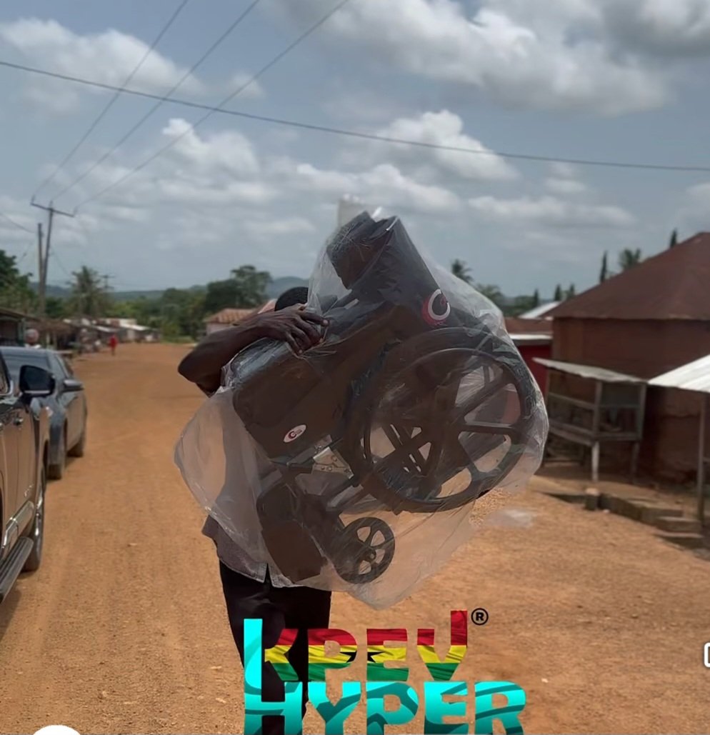 Afadzato South MP Hon. Frank Afriyie Donates Wheelchair to Ailing Elderly Resident in Dafor
