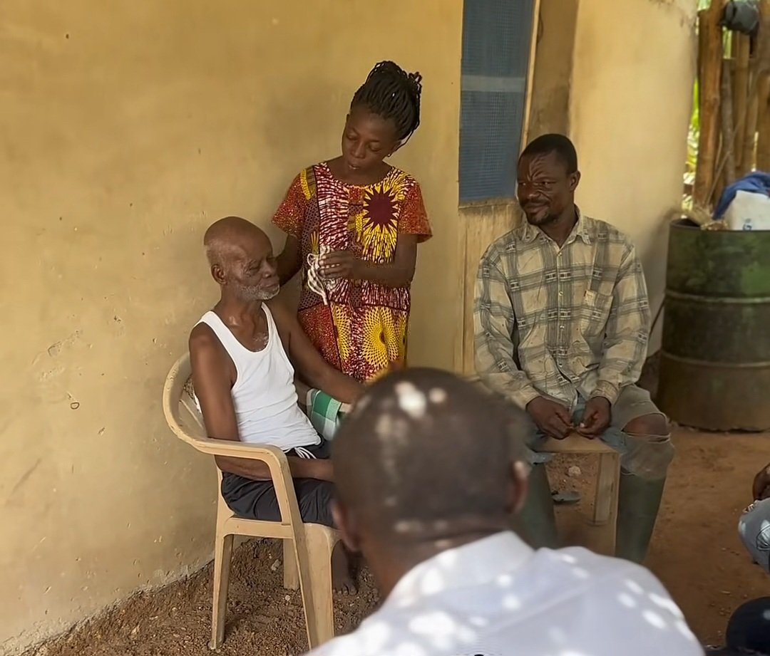 Afadzato South MP Hon. Frank Afriyie Donates Wheelchair to Ailing Elderly Resident in Dafor